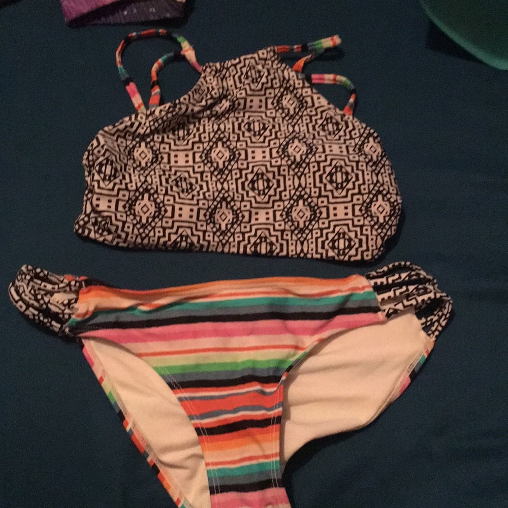 Kids small bathing suit top and medium bottoms